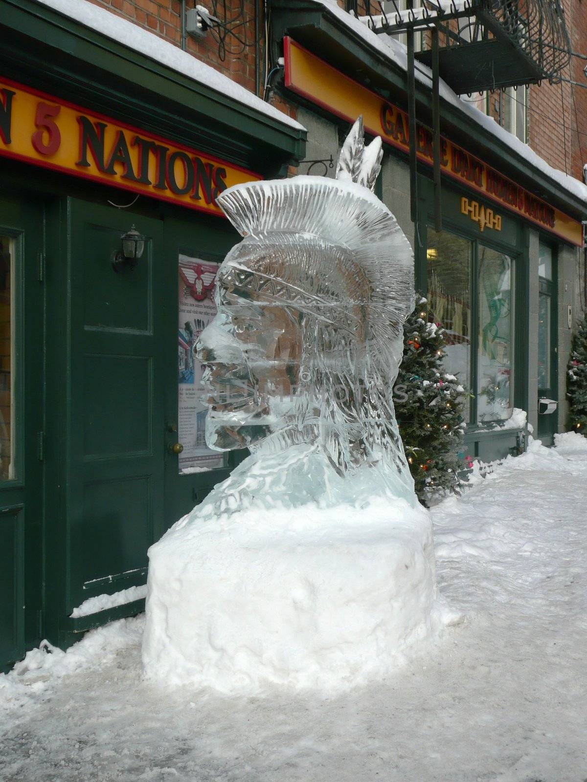 Artful ice sculpture of Indian head in Quebec city, Canada.