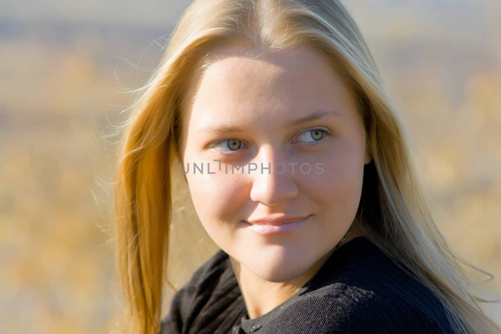 Portrait of the beautiful young girl