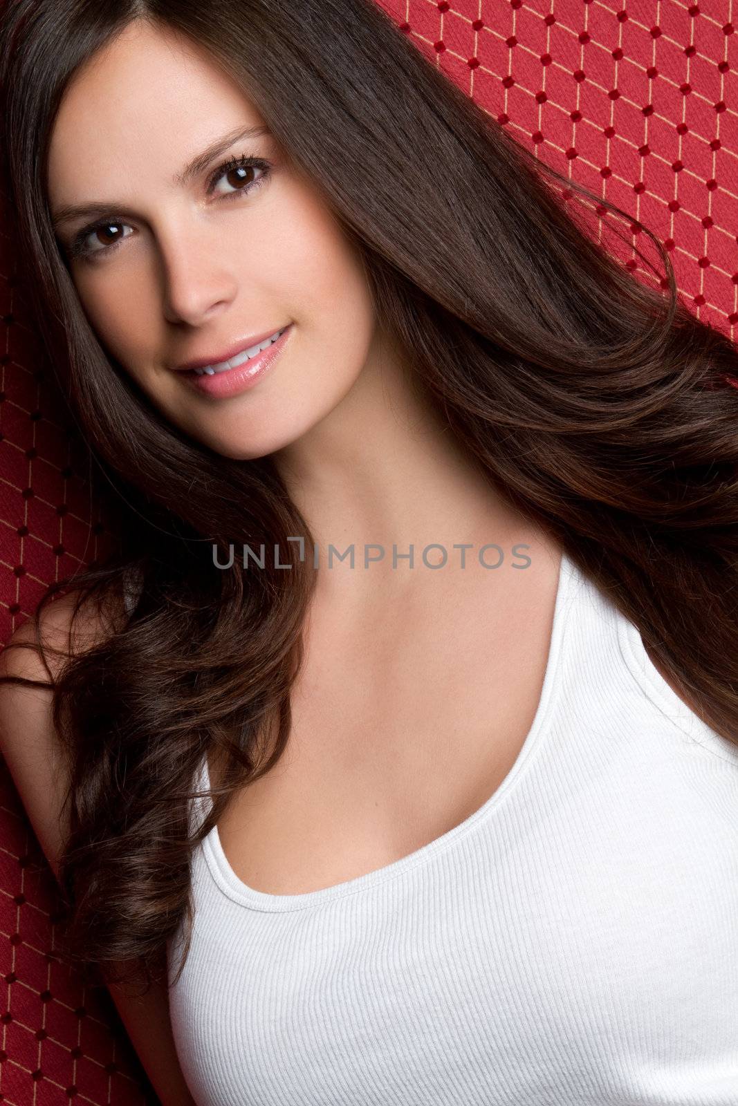 Smiling pretty young brunette woman