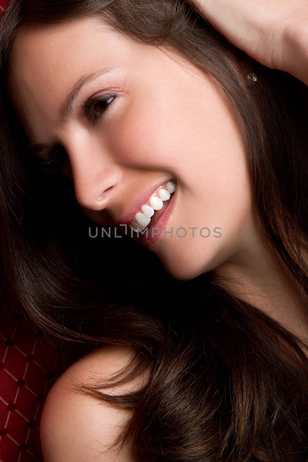 Beautiful laughing brunette woman