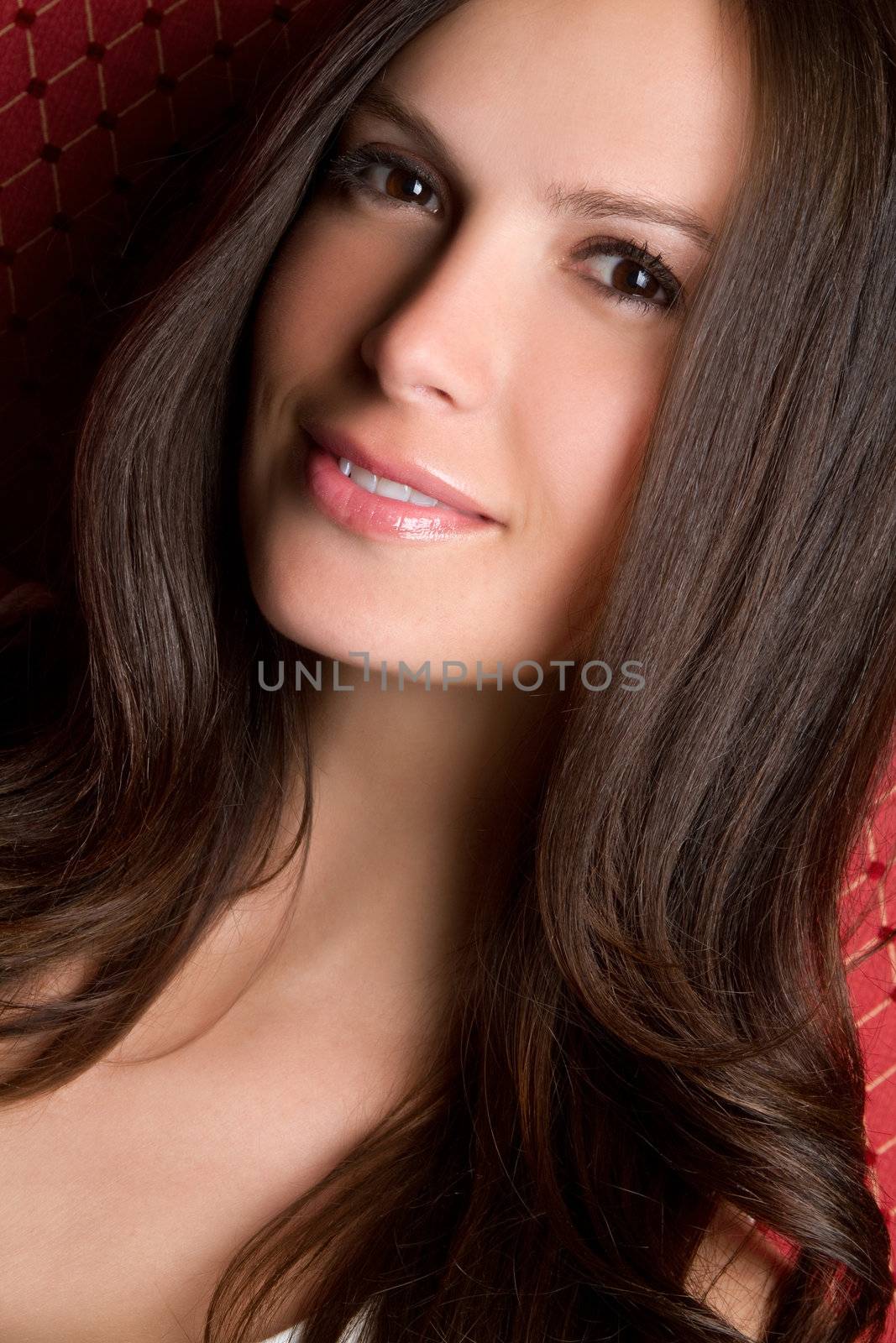 Beautiful smiling young brunette woman