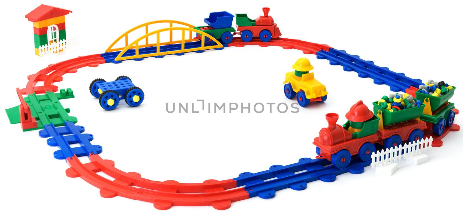 The children's plastic colour railway it is isolated on a white background