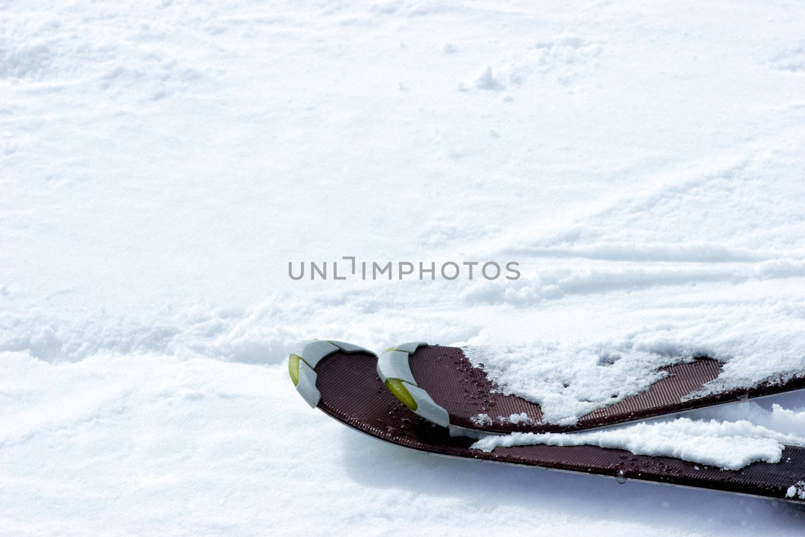 Skis on slope by naumoid