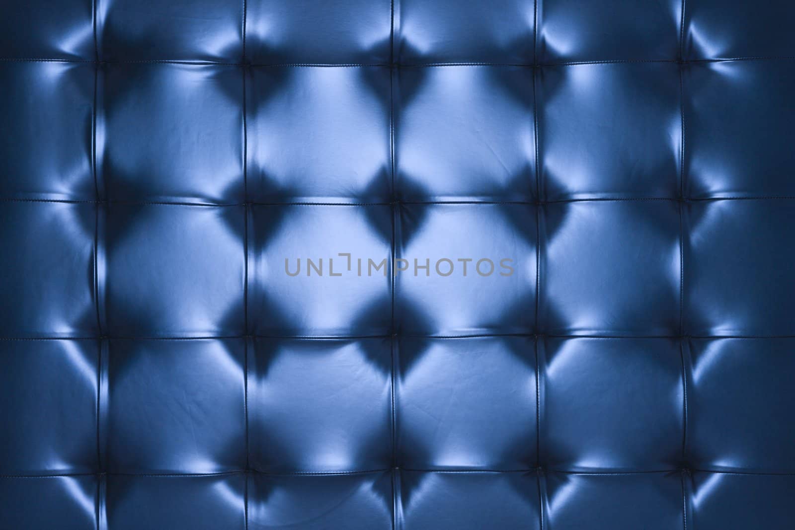 Blue leather cushion. by iofoto
