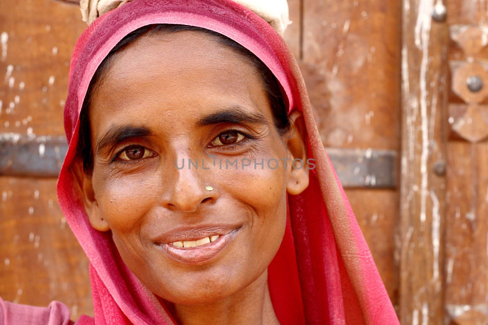 woman wearing a beautifully embroidered sari