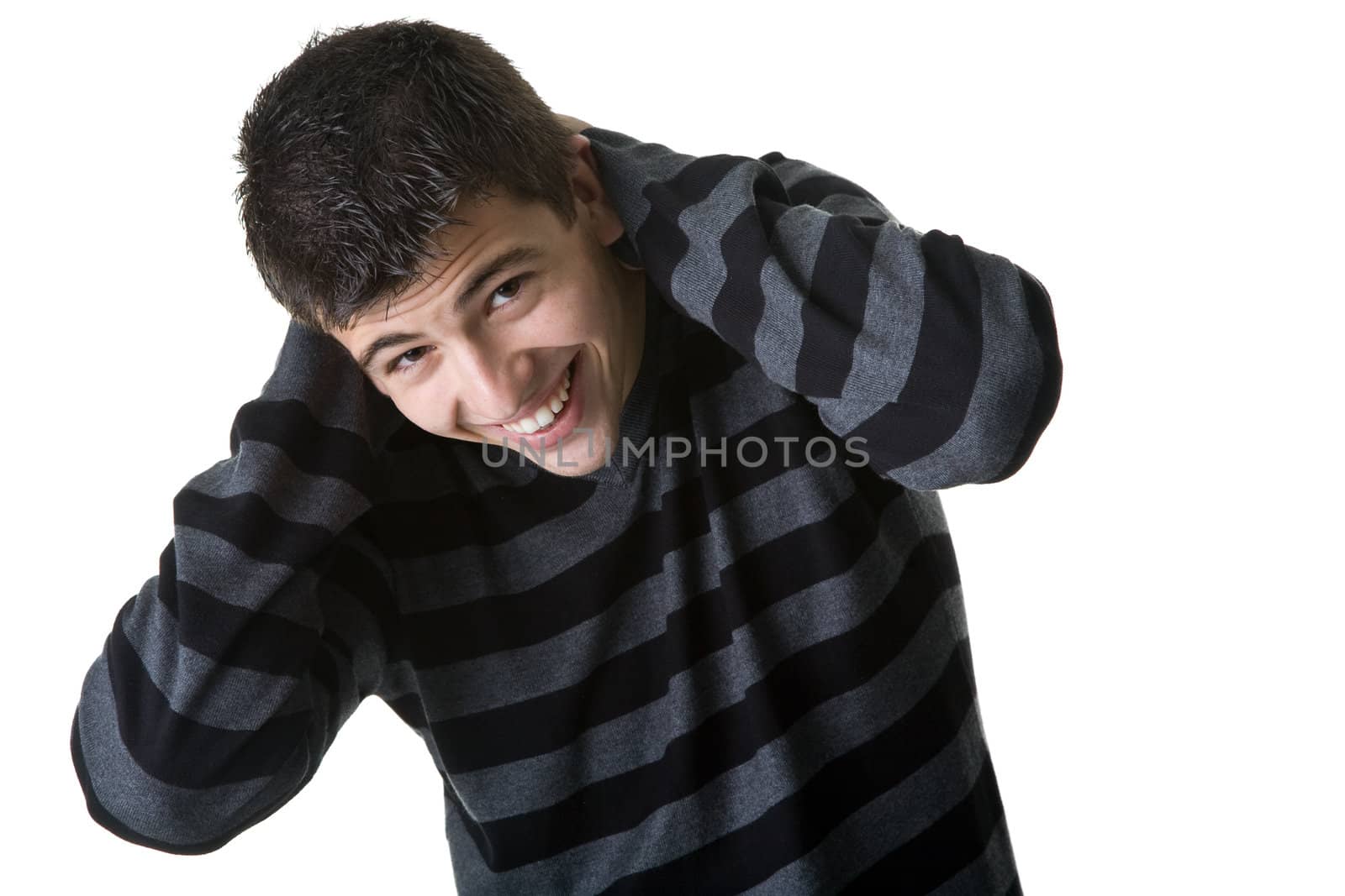 Portrait of a handsome young man laughing. Isolated on white background.