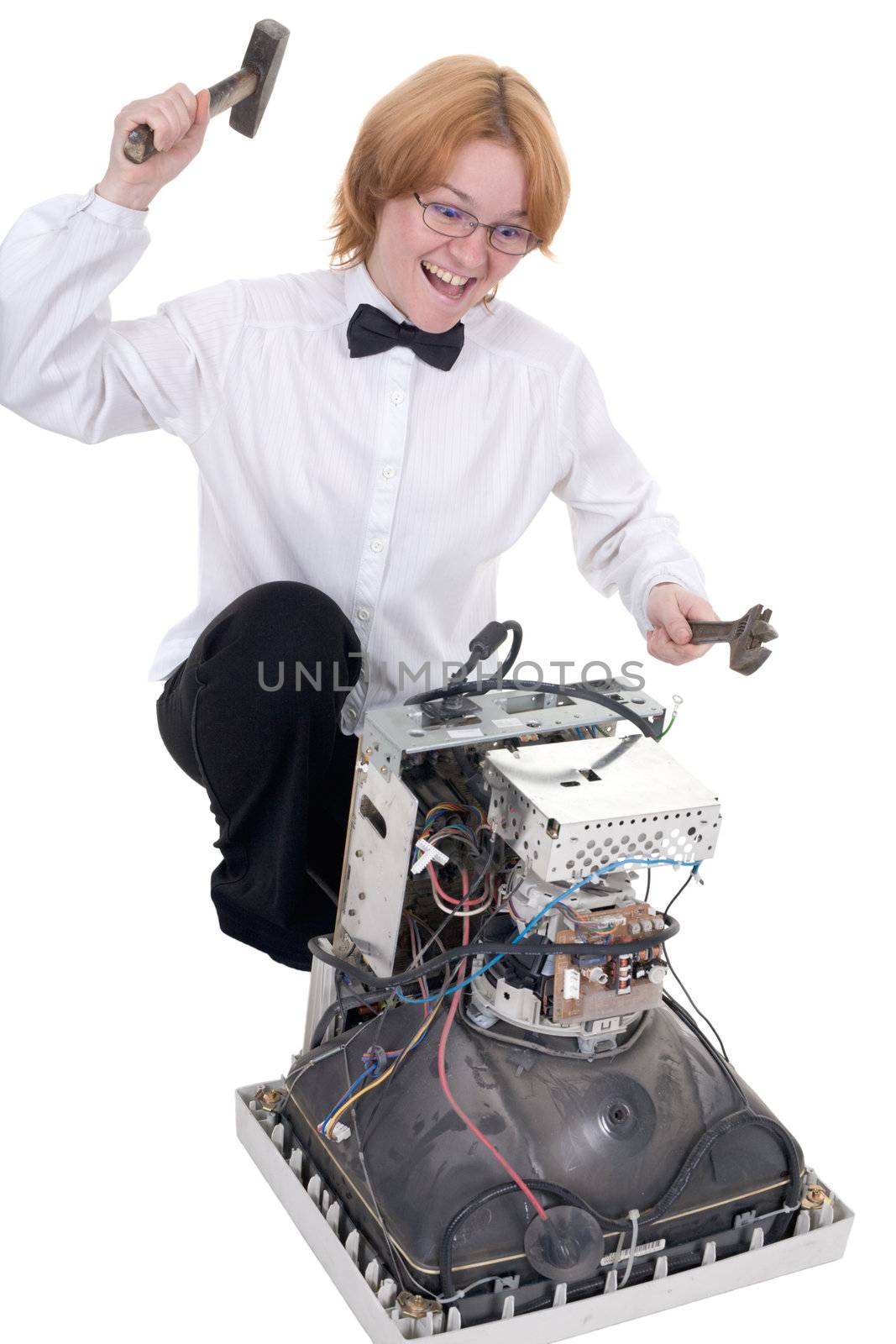 The girl repairing the old electronic equipment