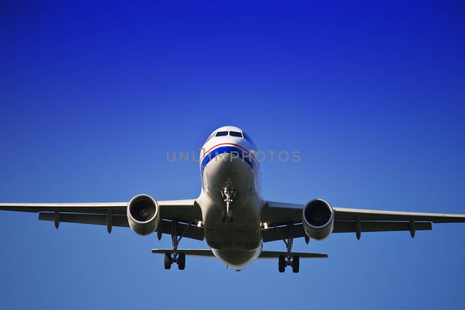 Jet airliner against blue sky
