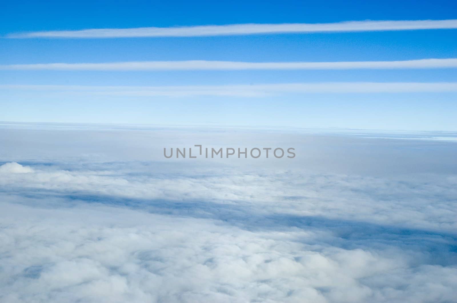 Aerial photo, showing beautiful skyscape. Blue sky covered with differnet clouds.