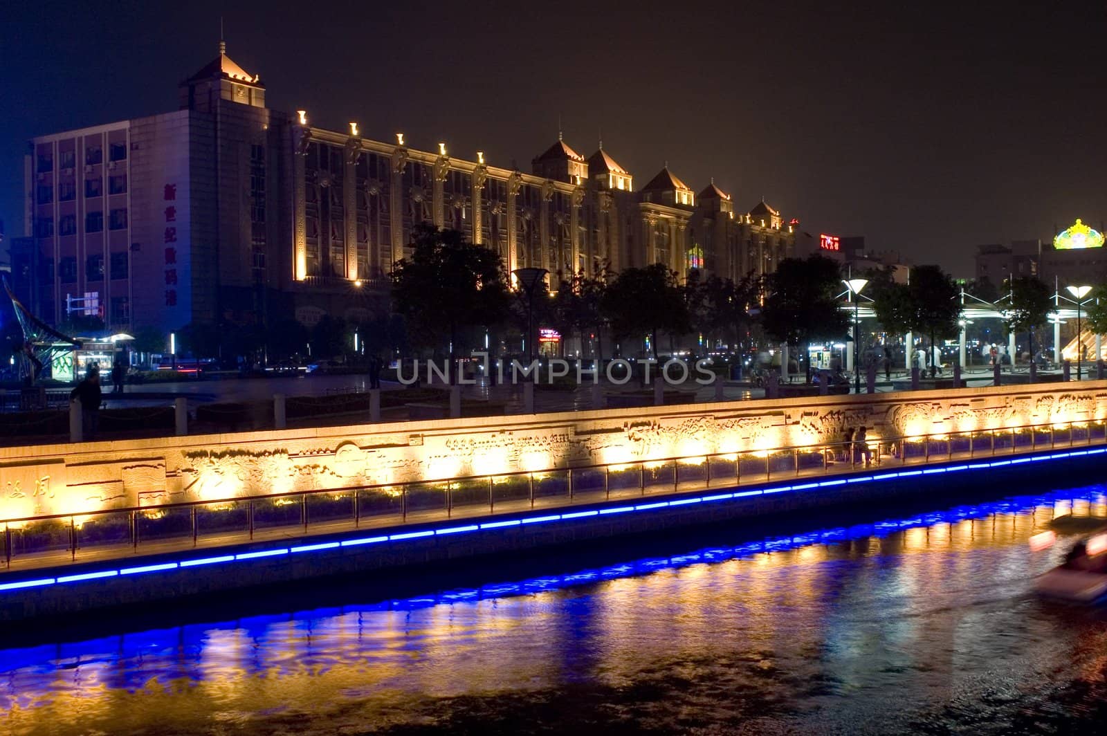 Nightscape of Nantong city, Jiangsu province, China. Wonderful cityscape with famous Haohe river. 