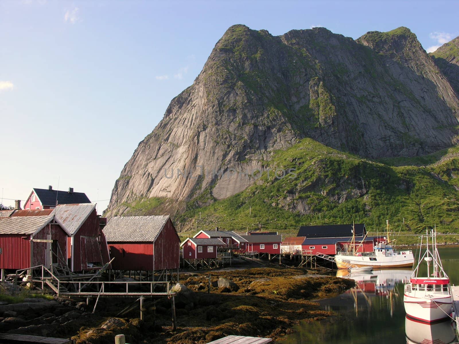 Little harbor in Lofoten,Norway Houses over a river