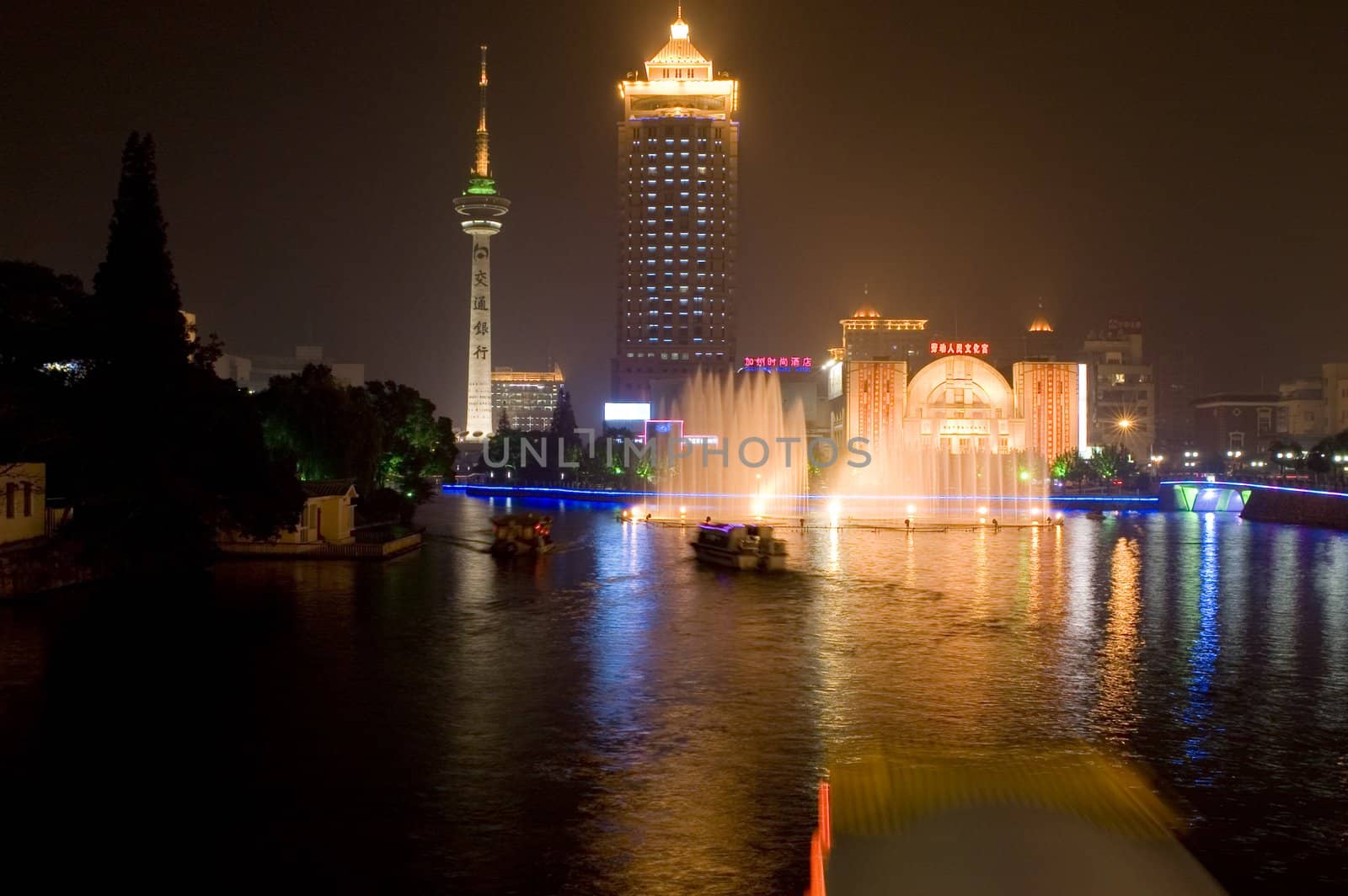 Nightscape of Nantong city, Jiangsu province, China. Wonderful cityscape with famous Haohe river. 