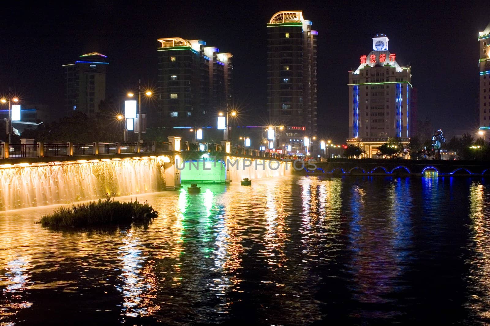 Nightscape of Nantong city, Jiangsu province, China. Wonderful cityscape with famous Haohe river. 