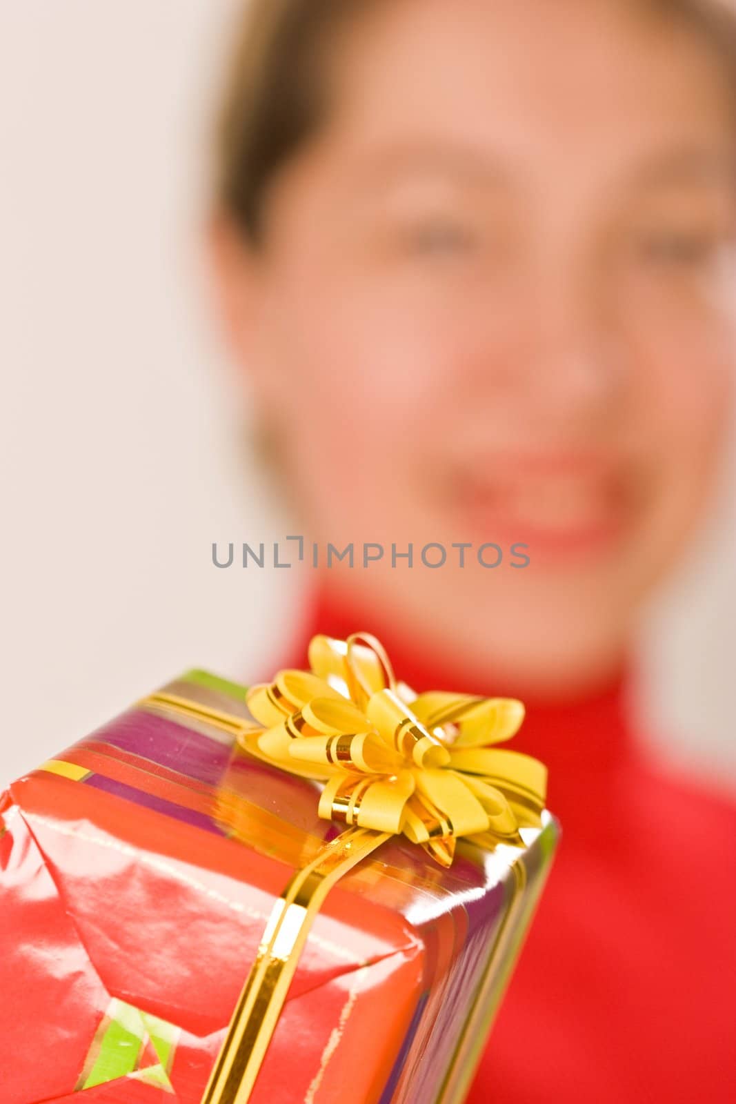 ledy in red with gift, make a present
