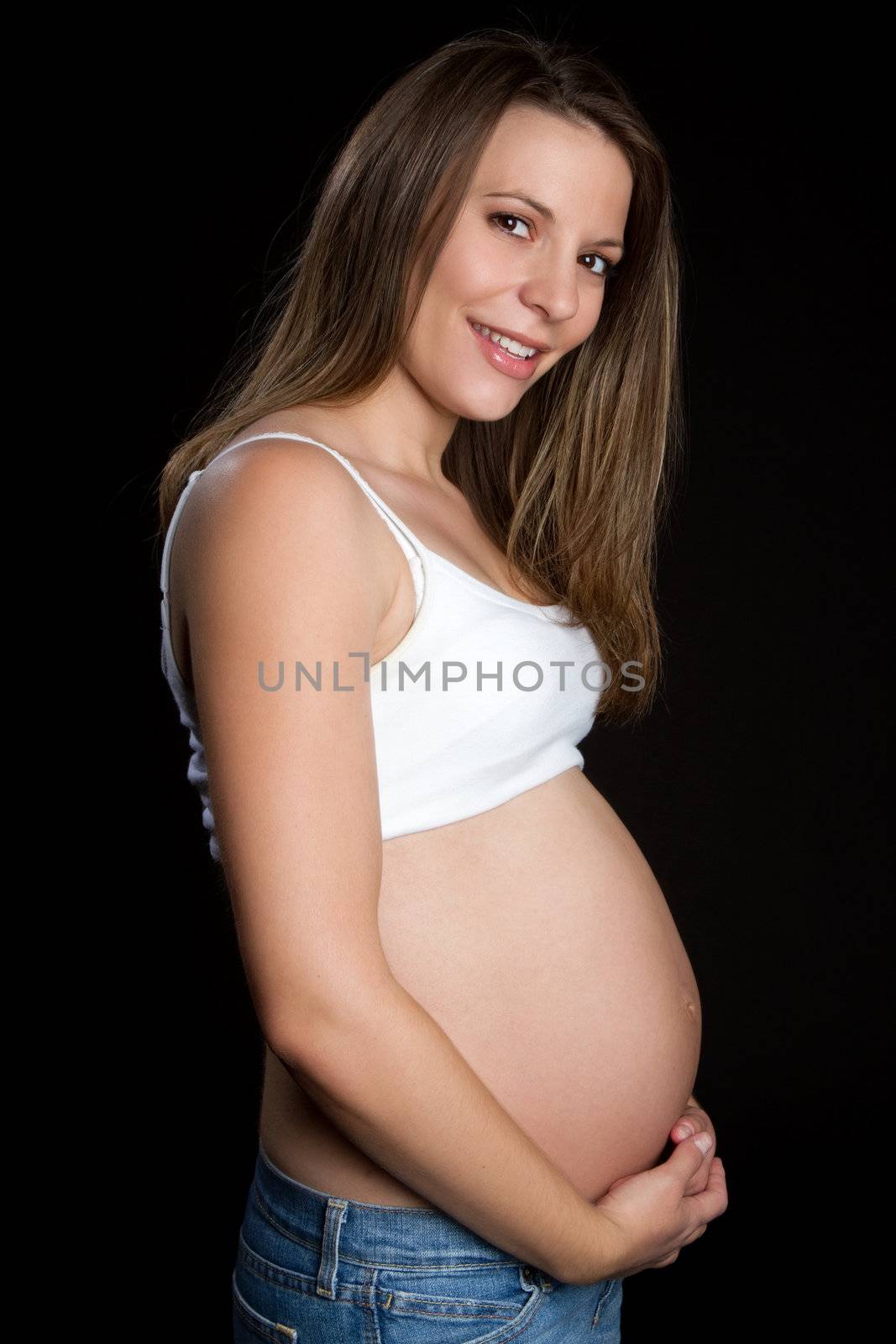 Beautiful happy pregnant girl smiling