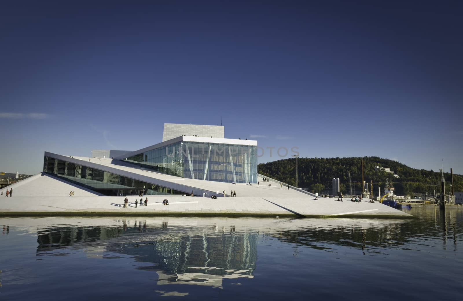 The new operahouse in Oslo, Norway. Building was finished 2008. The exteriors are built of marble and glass, and the roofs and exteriors are open for the public.