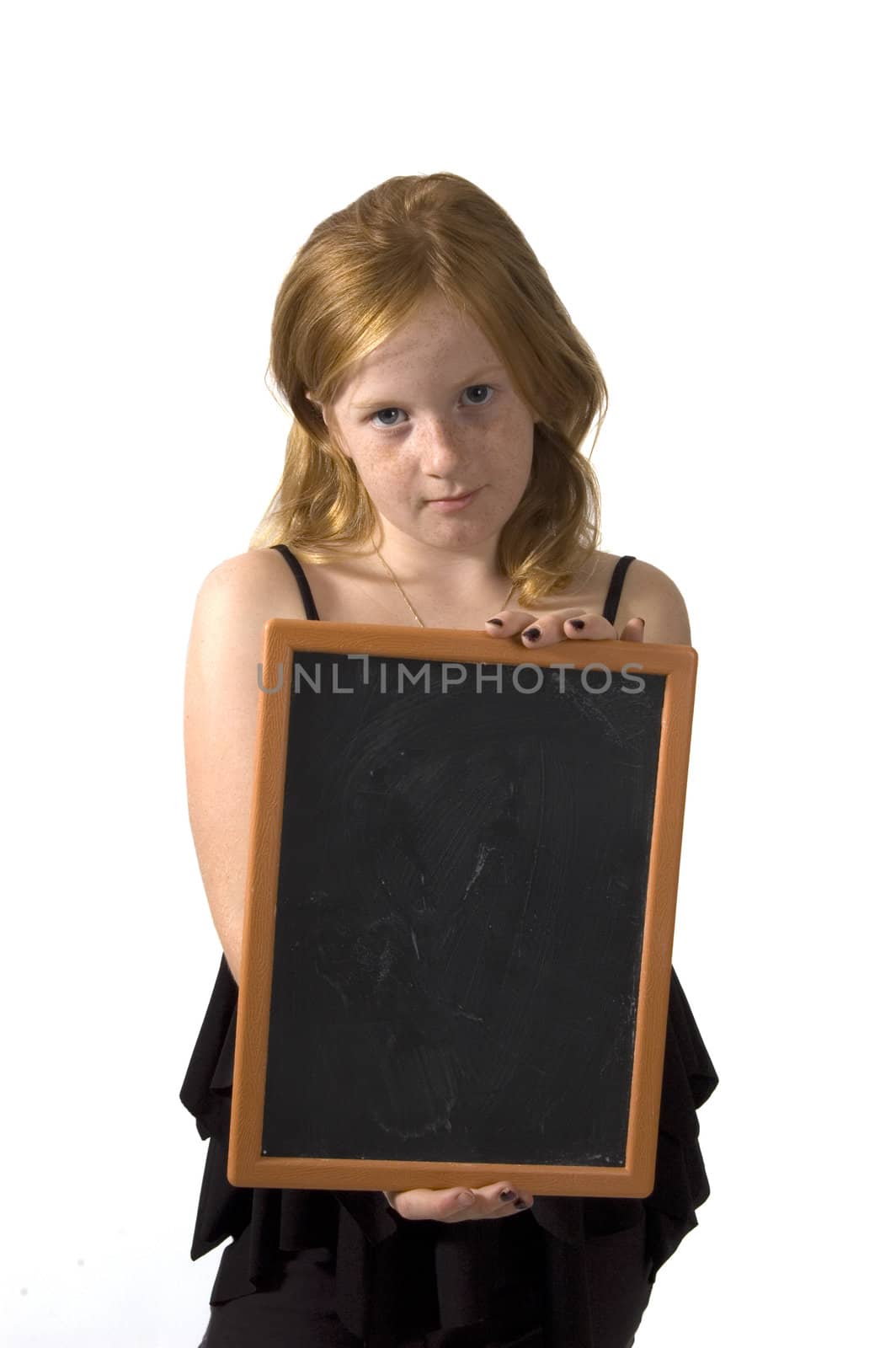 little girl is holding an empty chalkboard