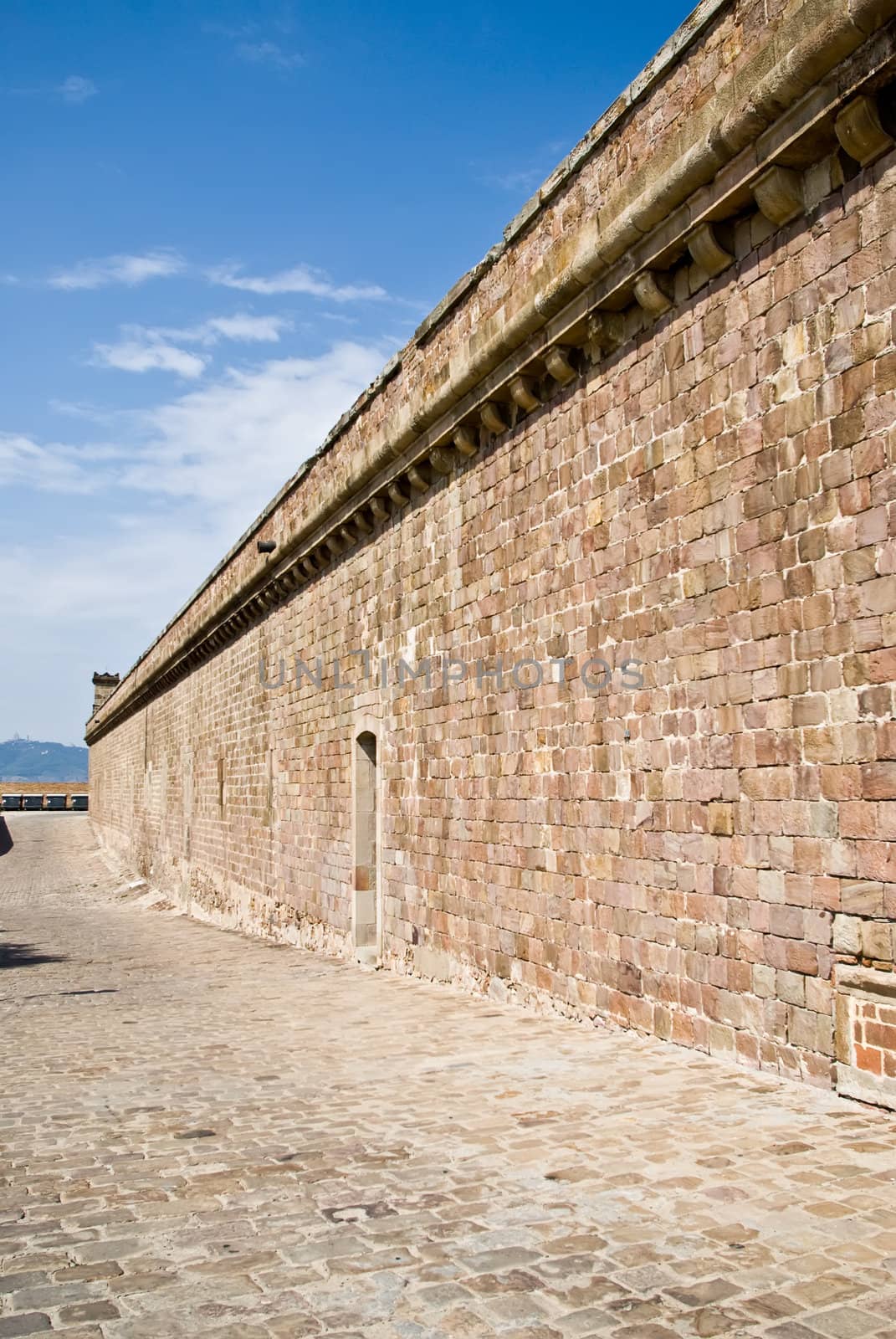 the wall of castell de montjuic