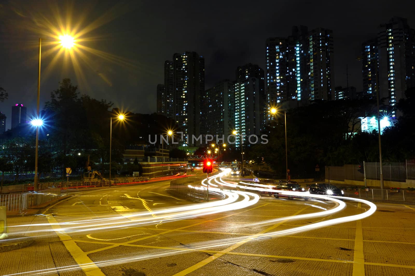 High traffic road with motion blurred automobile