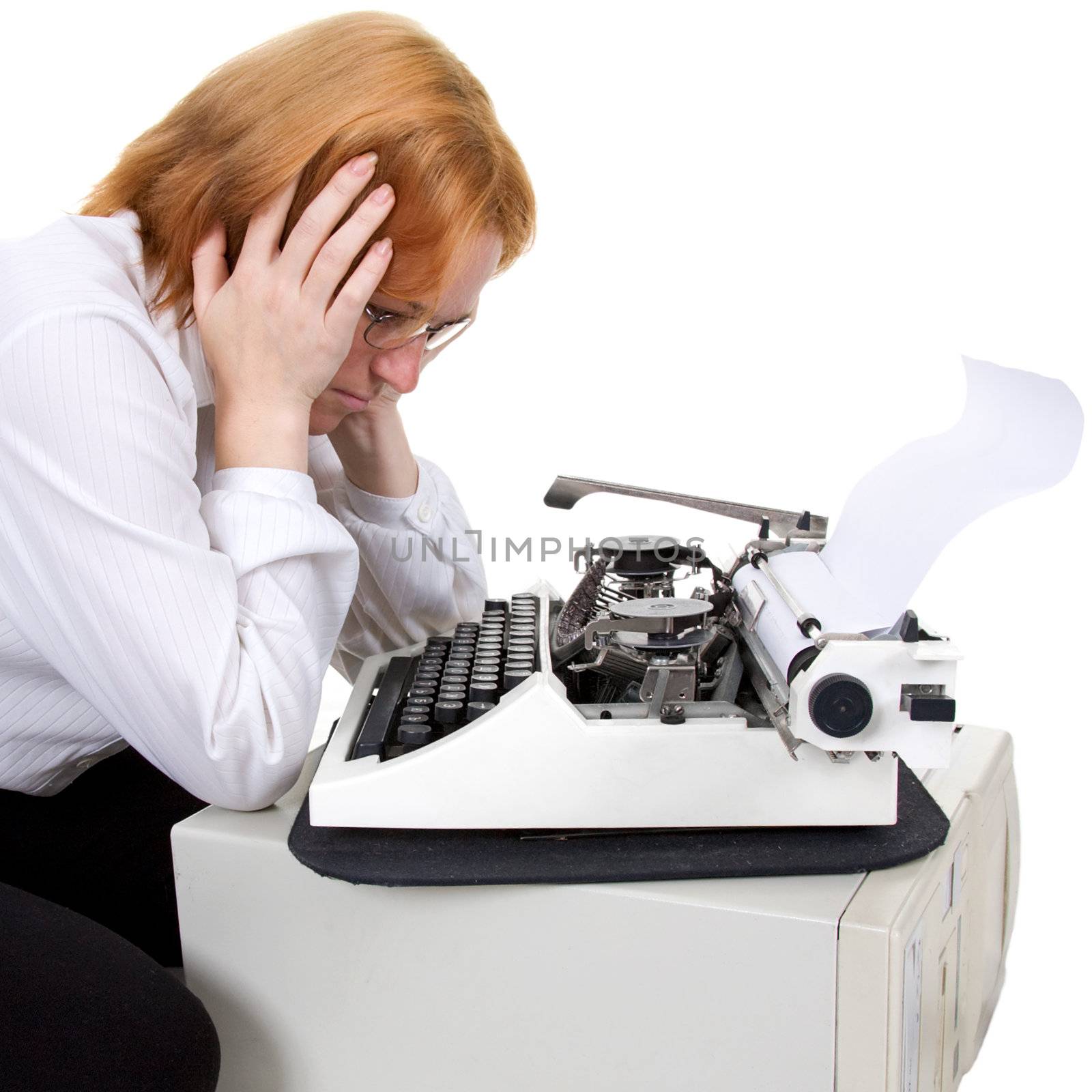 The woman near a typewriter on a white background
