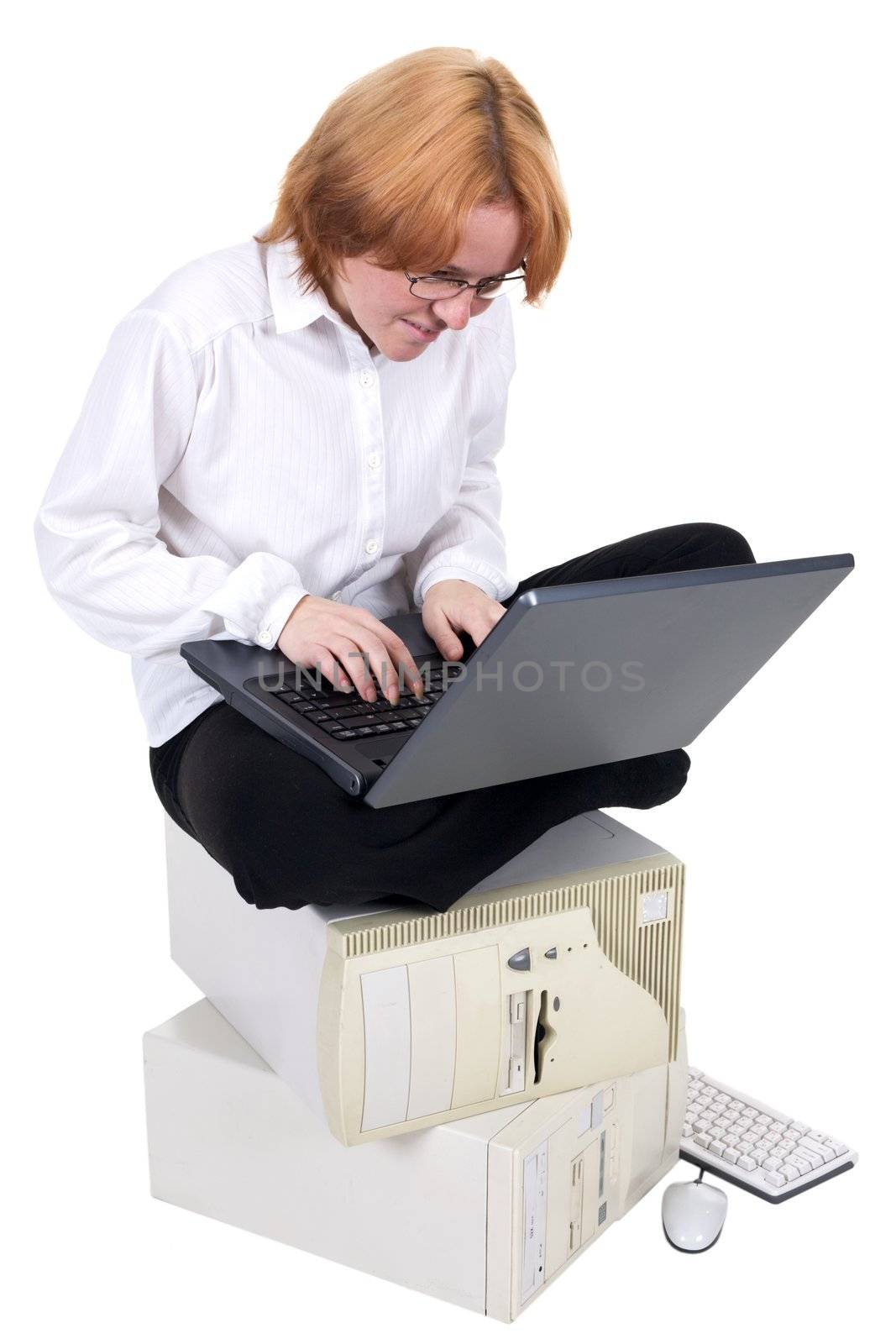 Girl working on the laptop on a white by pzaxe