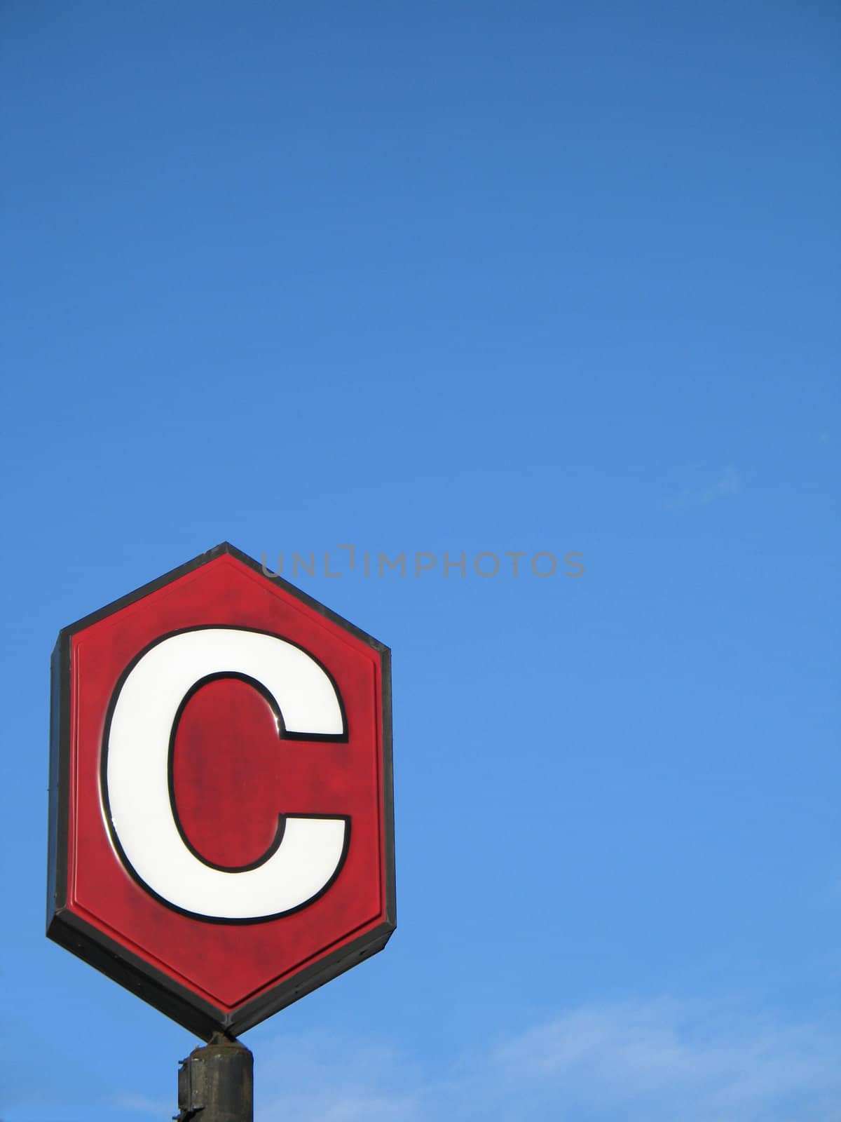 red c sign