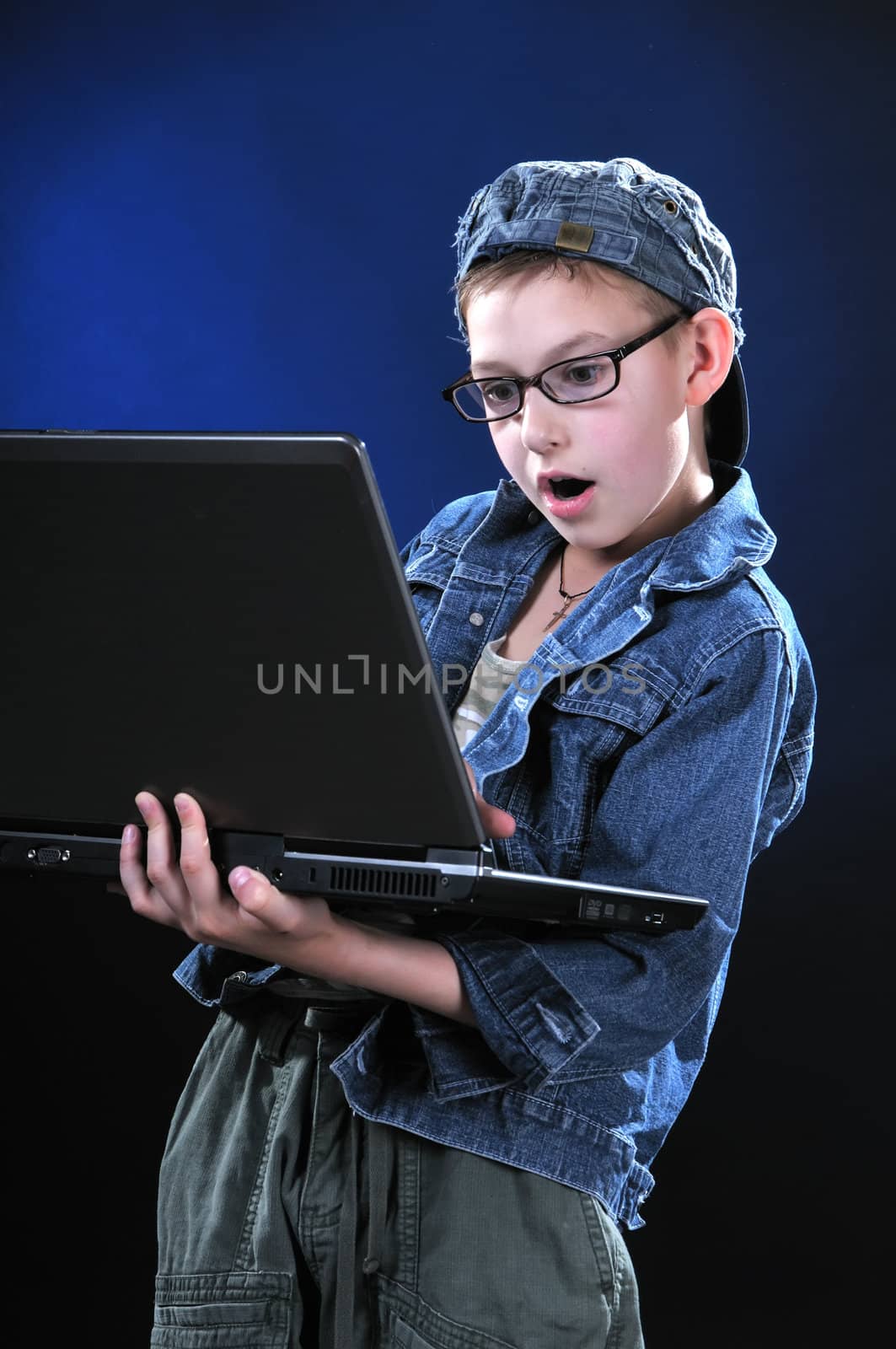 boy of ten years is led away a game on the computer