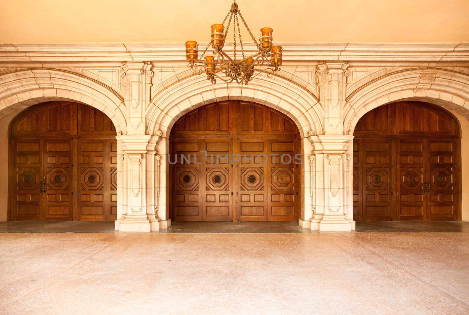 Three Majestic Classic Arched Doors with Chandelier.