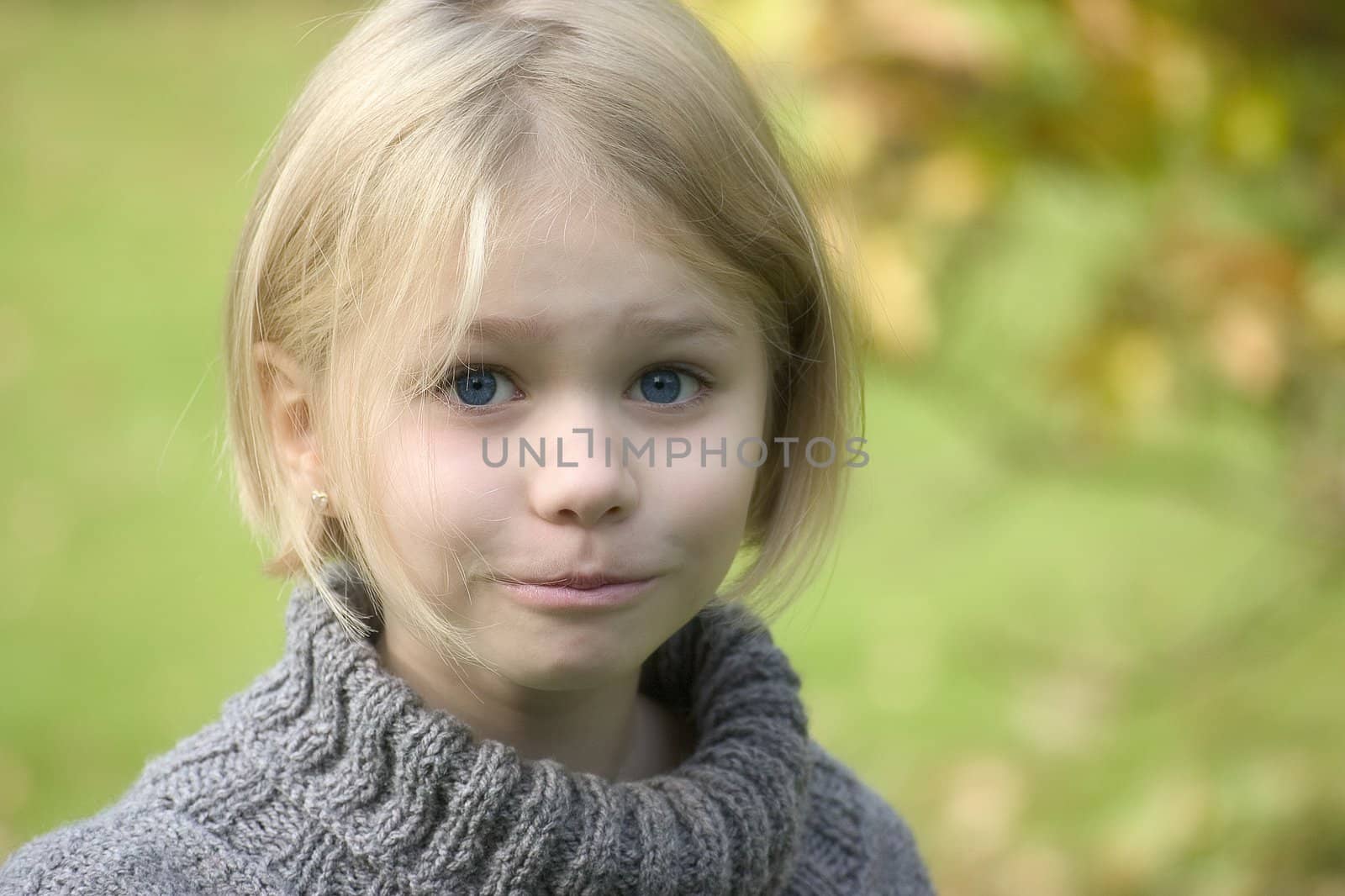 Portrait of girl in the open air, blurred background