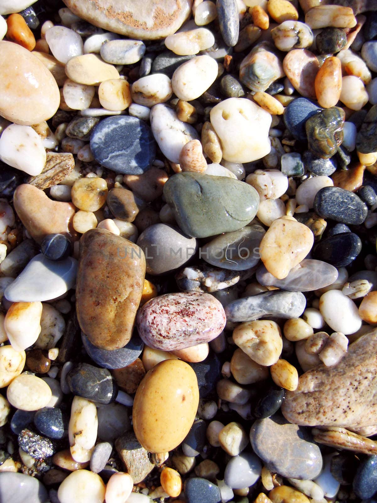 pebble stones background on the beach