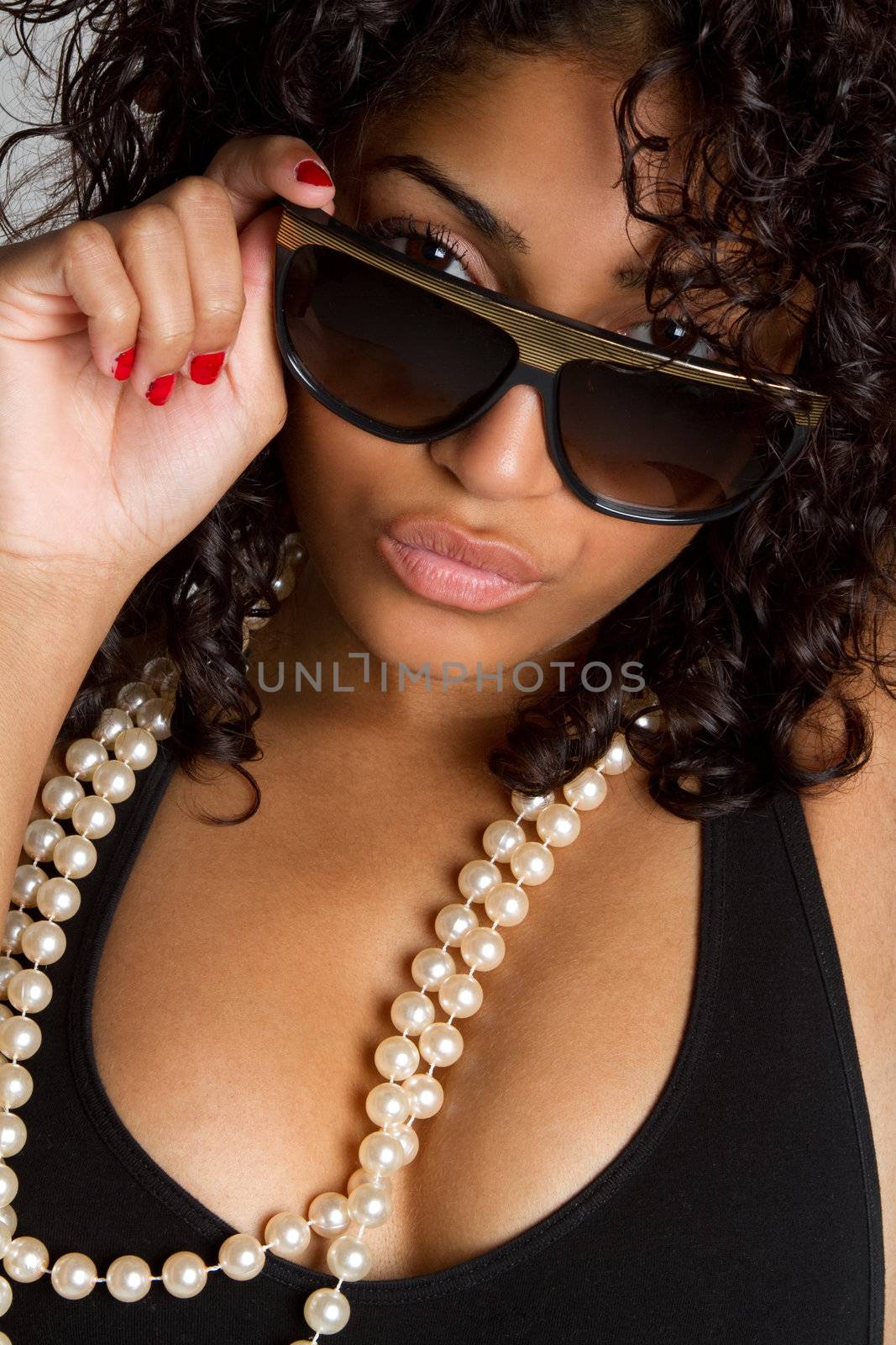 Sexy black woman wearing sunglasses