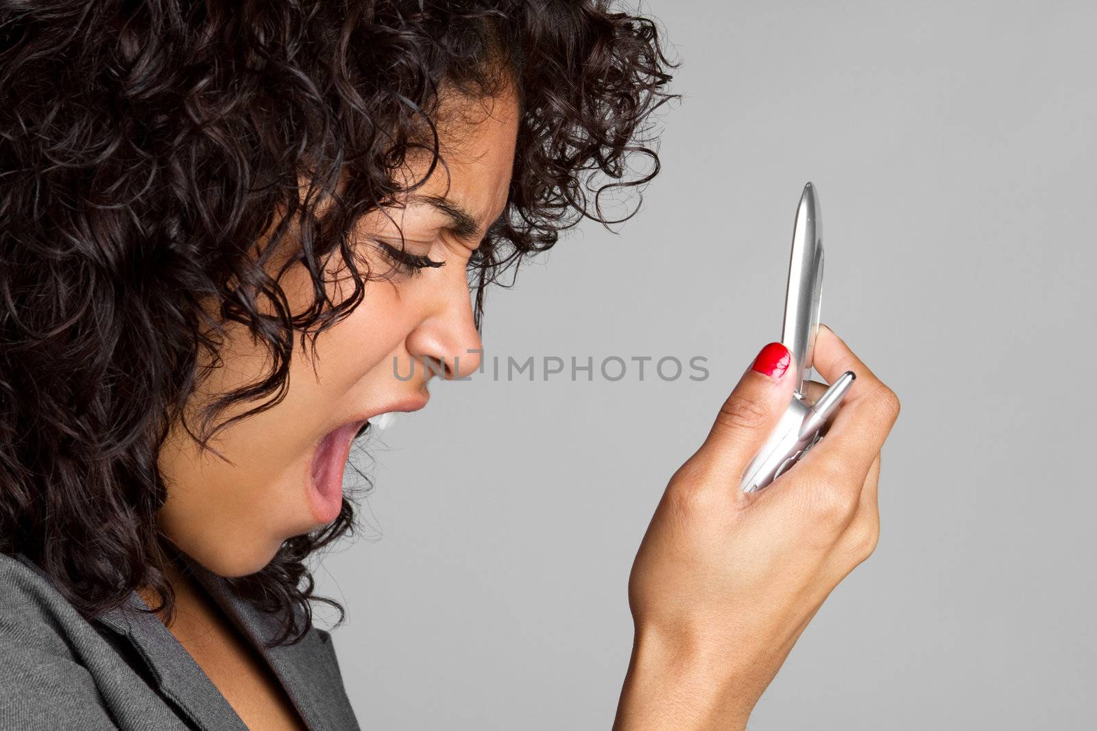 Black woman yelling into phone