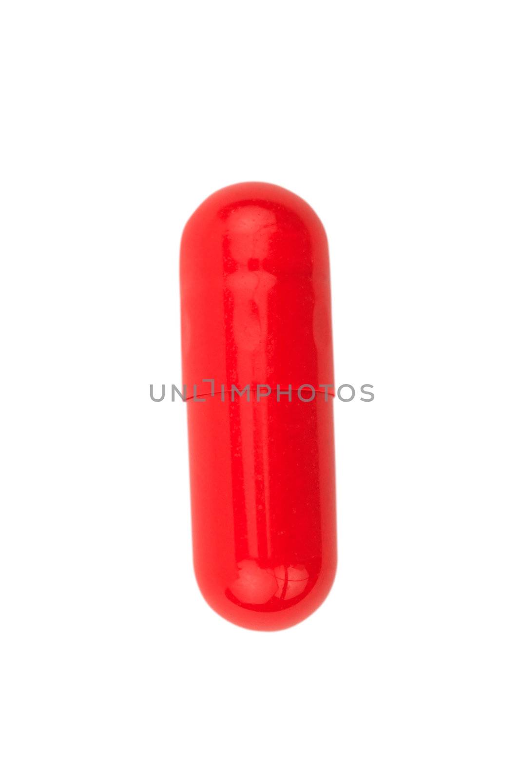 Red capsule pill isolated on white with clipping path included. 