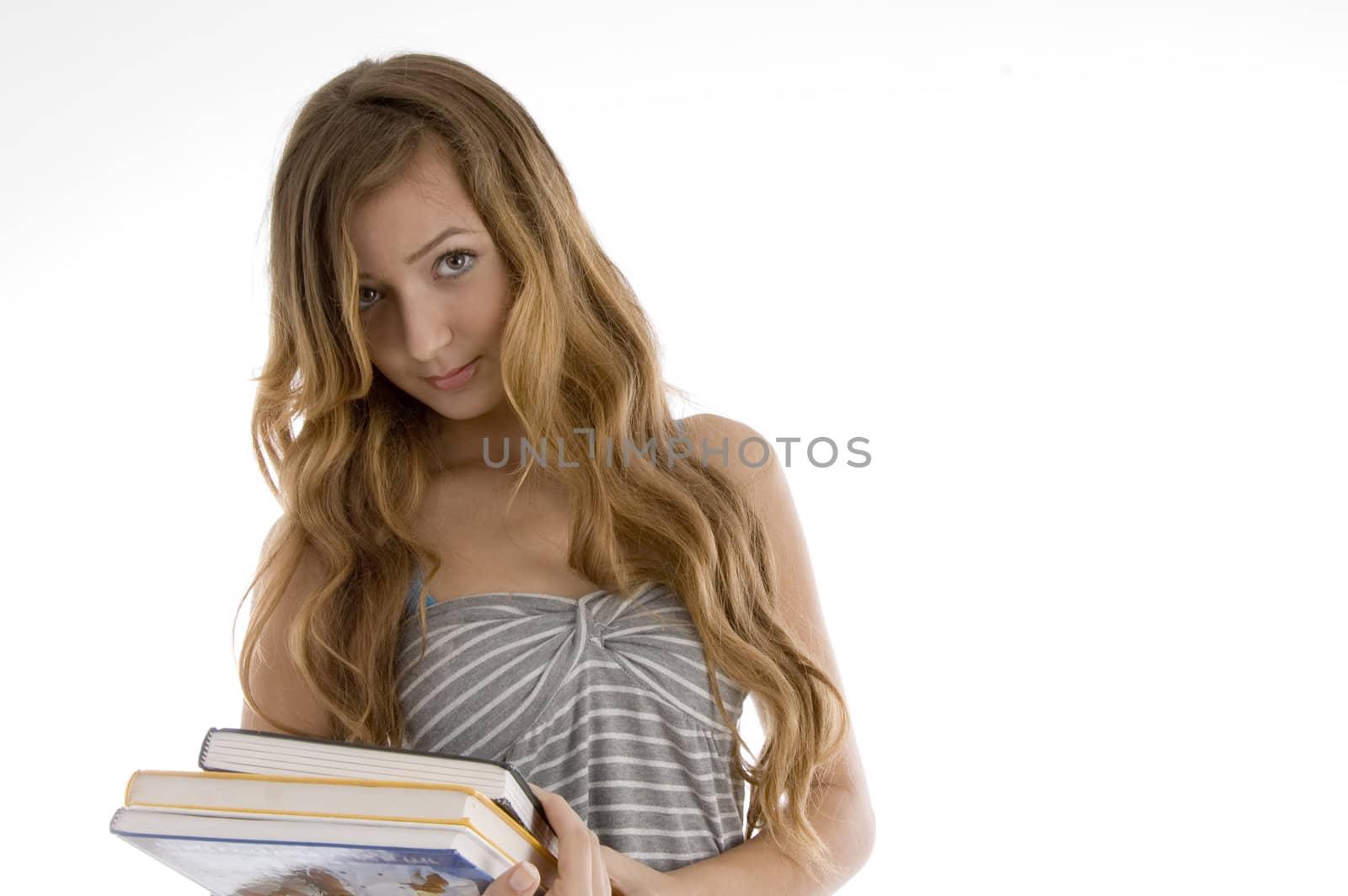 young female student looking at camera on  an isolated white background 