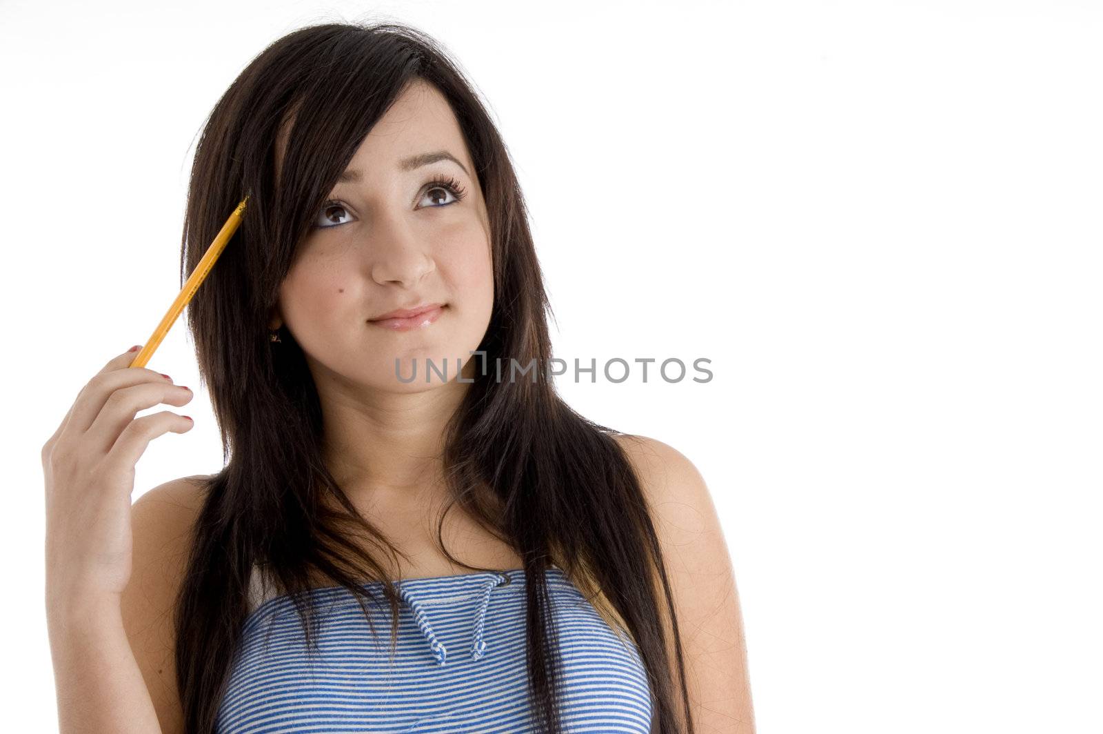 school girl thinking with a pencil in her hand on  an isolated white background 