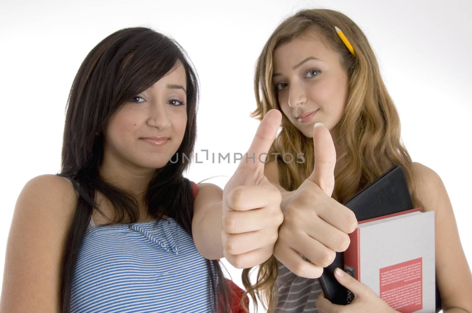 young friends wishing goodluck on  an isolated white background 