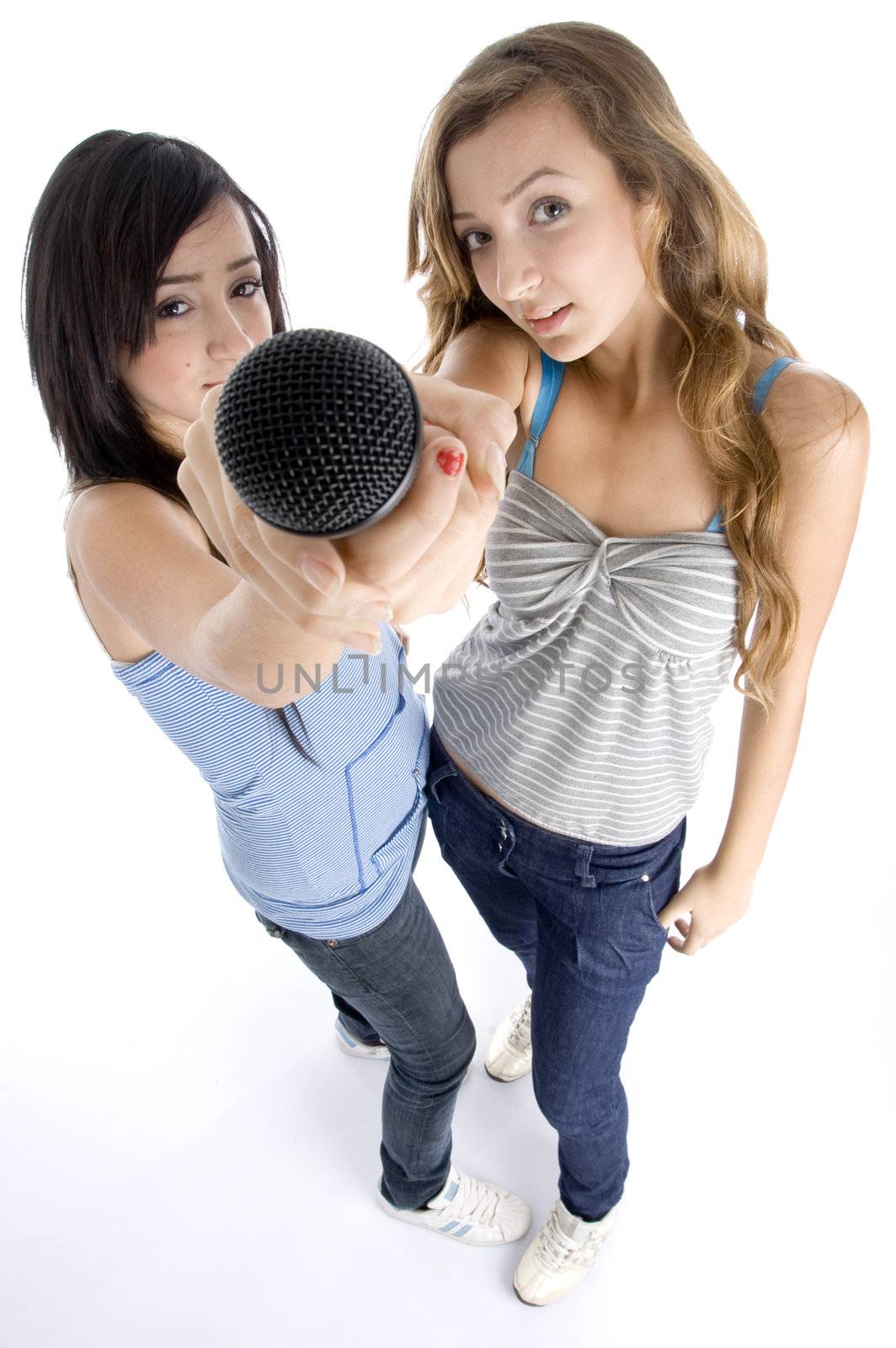 young girls showing microphone by imagerymajestic