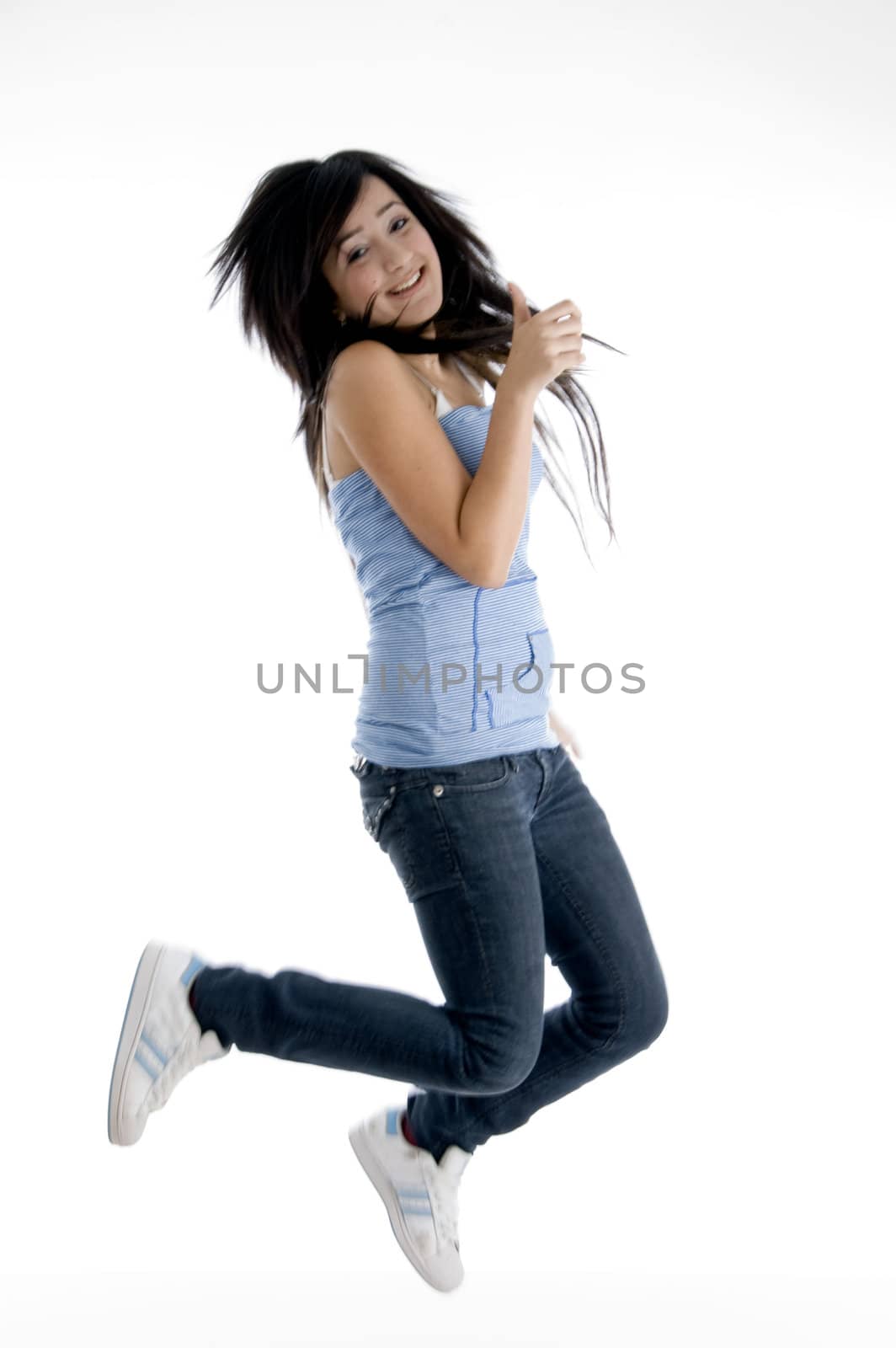 young girl doing dance on  an isolated white background 