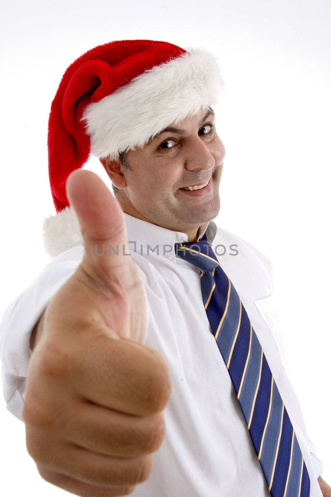 smiling businessman with christmas hat showing approval sign on  an isolated white background 