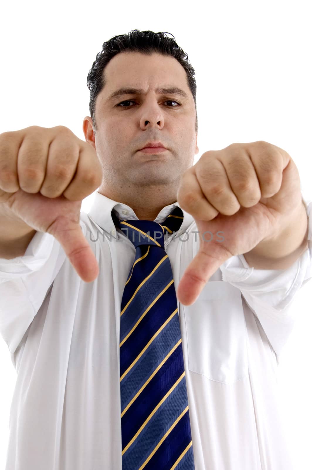 serious businessman showing thumb down gesture on  an isolated white background 