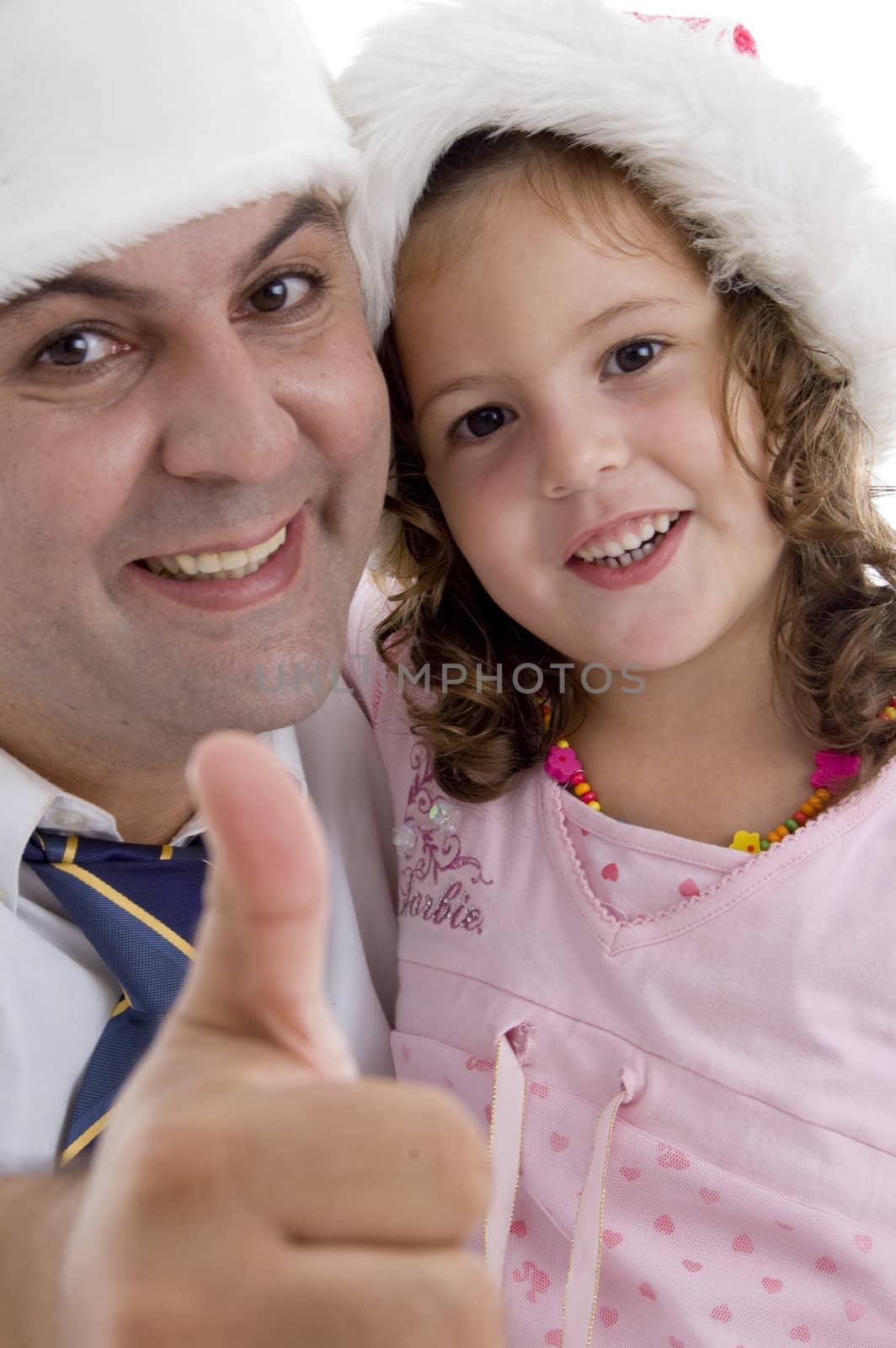 smiling father and daughter with christmas  hat