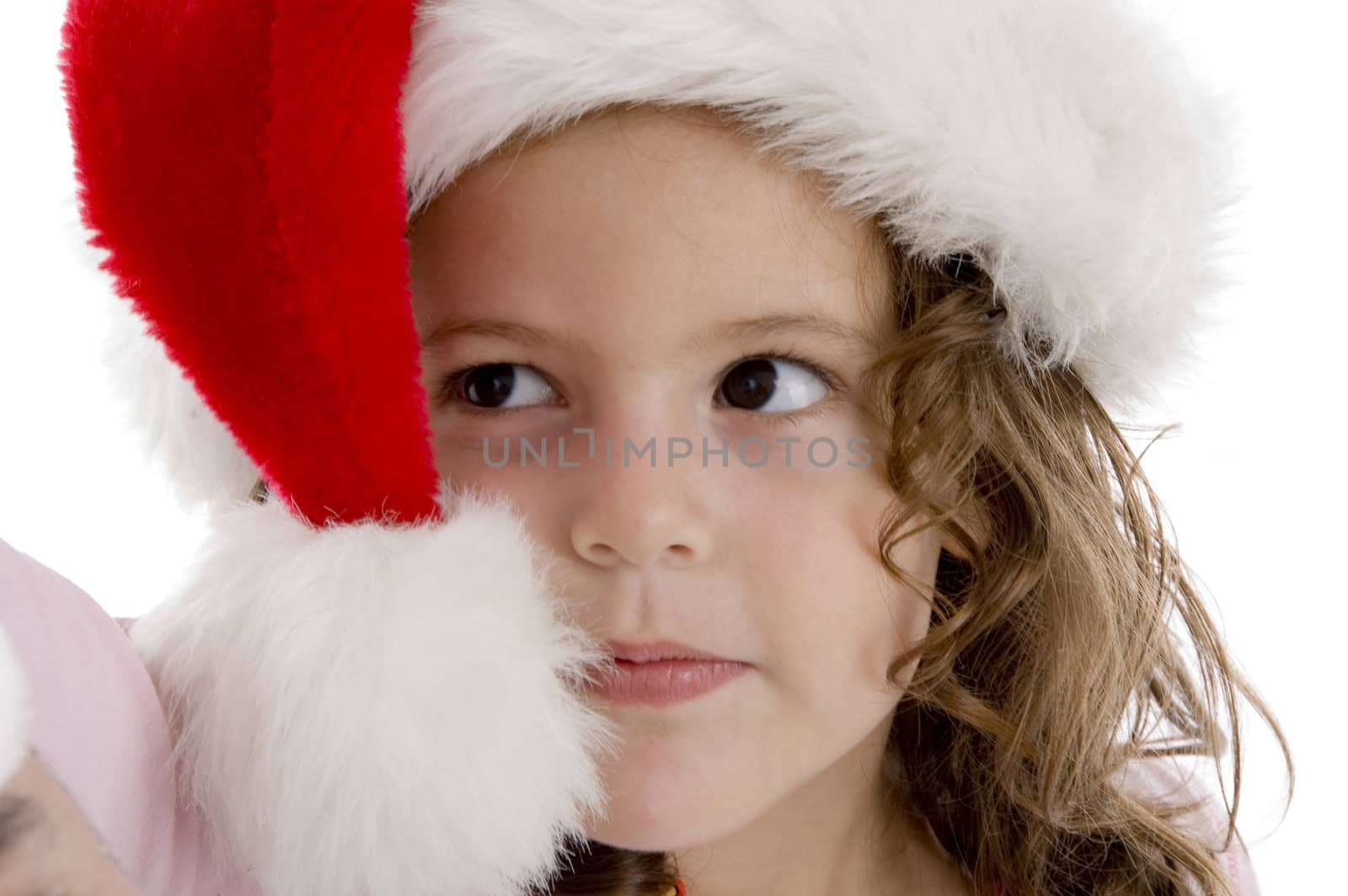little girl wearing christmas hat by imagerymajestic