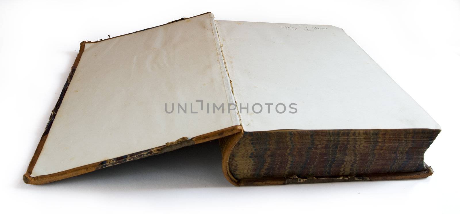 Old open book isolated on white background. Clipping path included to remove object shadow or replace background.