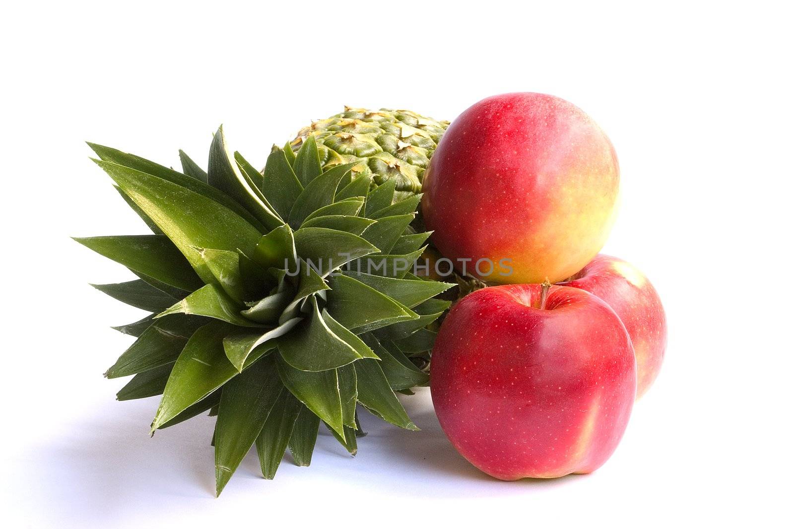 Ananas and Apples isolated on white background.