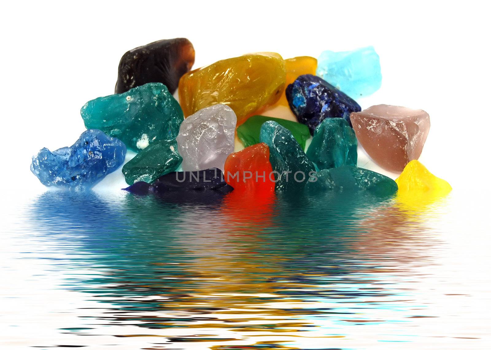 set of colored pieces of glass in water
