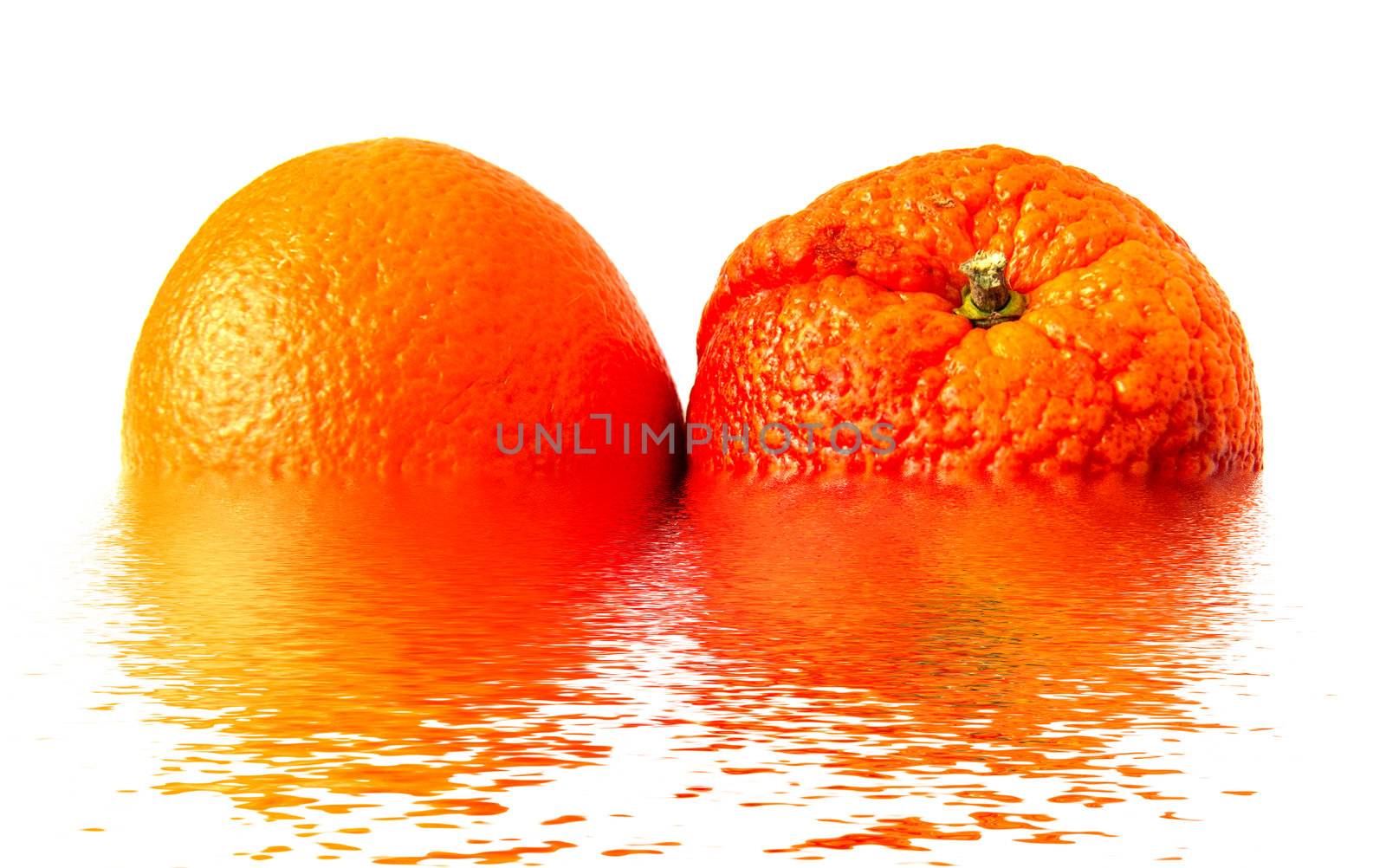 colored oranges, one have rough surface pattern