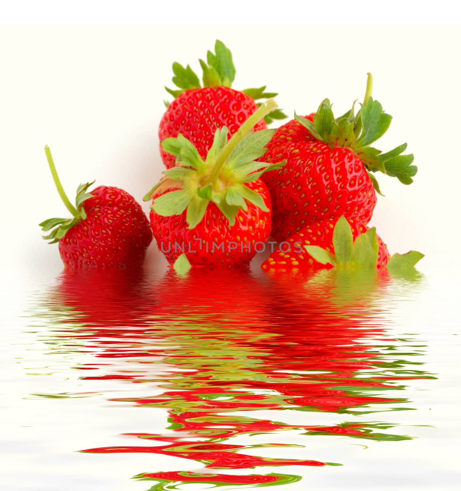 set of fresh red strawberries in water