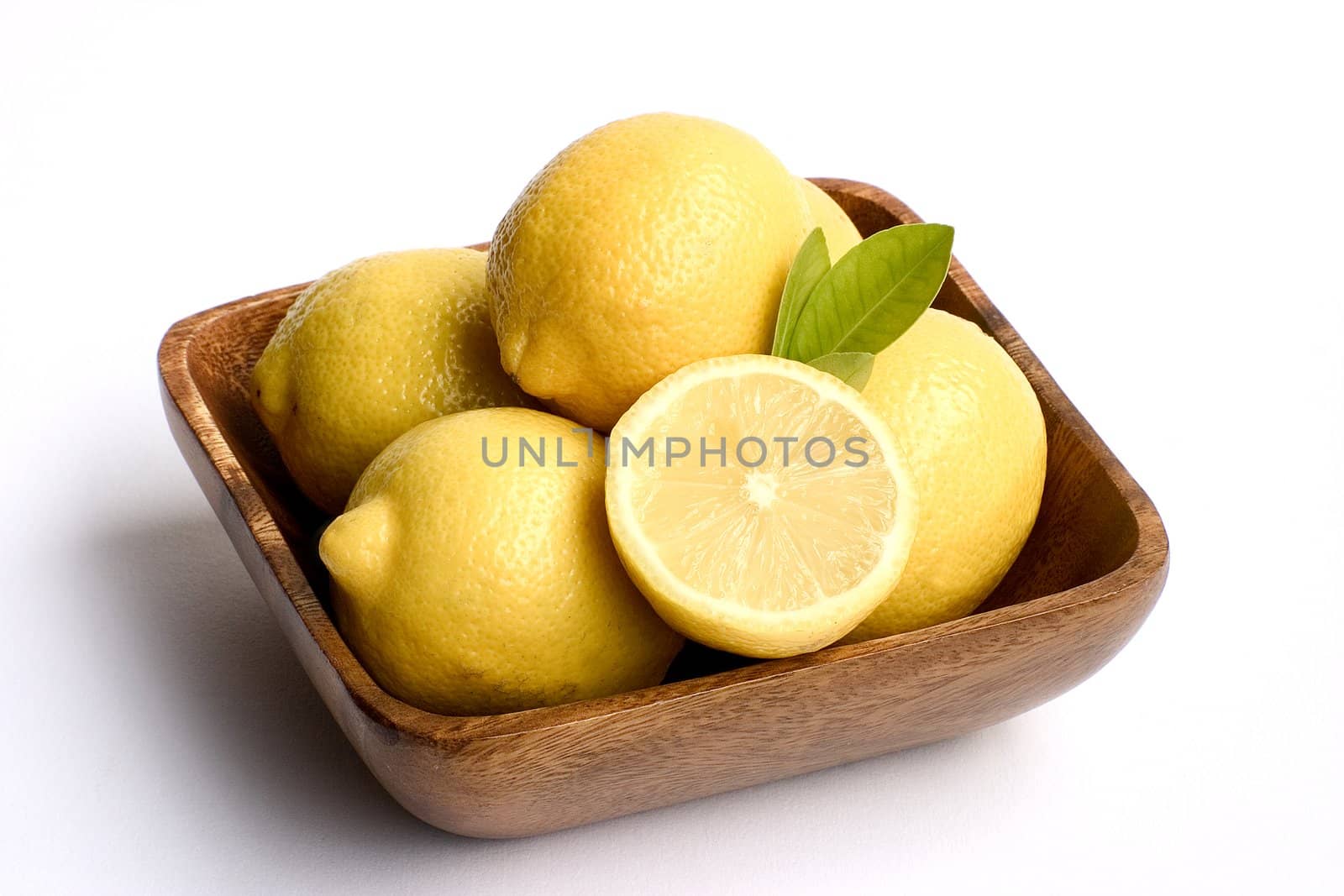 A bowl of bright yellow lemons.