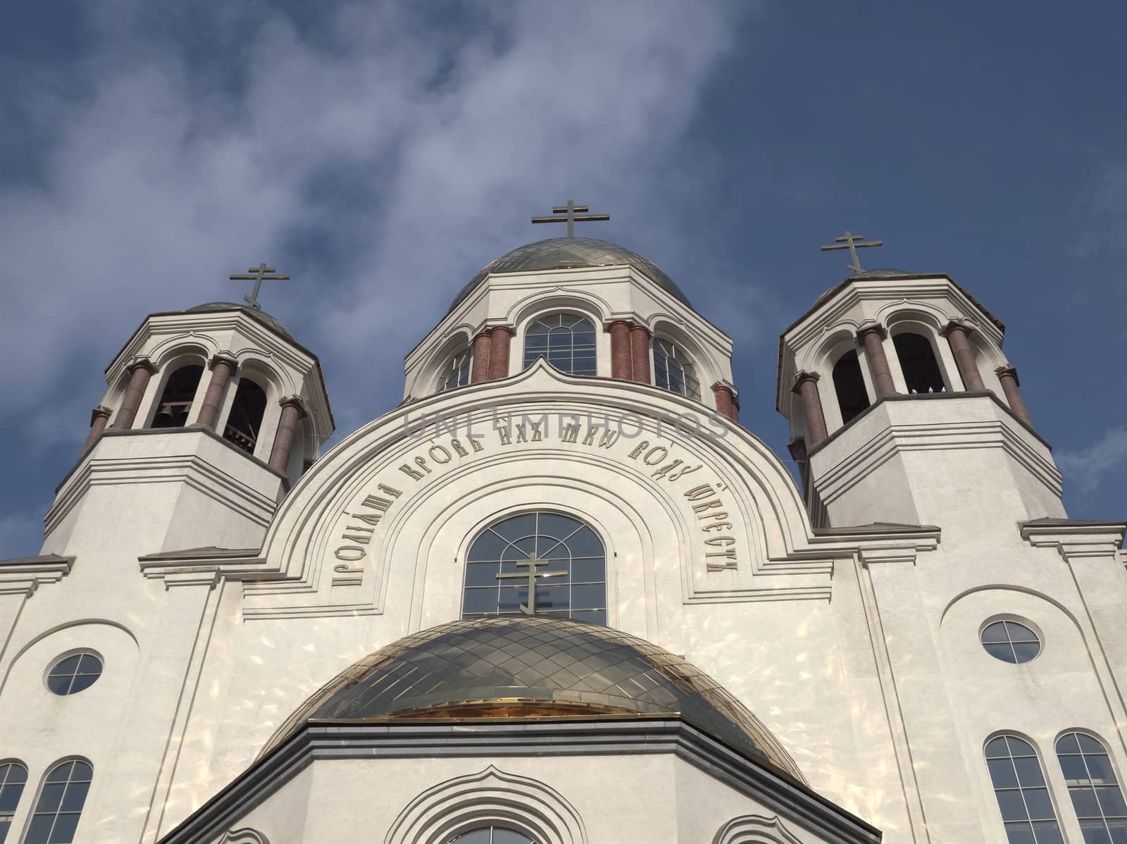 Temple On Blood. Domes, crosses on a background of the dark blue sky. The city of Ekaterinburg. Russia.