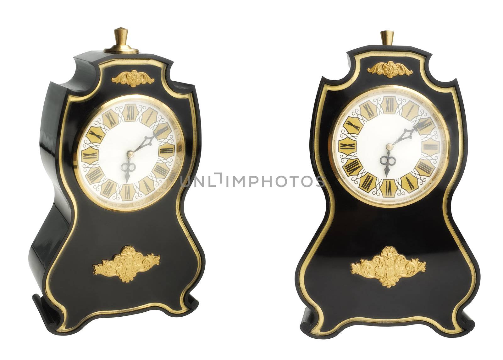 Ancient clock with ornament and scratches on glass isolated on white background. Two points of view.